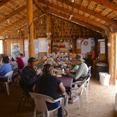 more people eating in the palapa