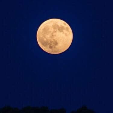 A full moon in the desert